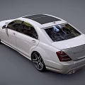 White Mercedes Luxury Sedan with Sleek Body Design Alloy Wheels and Chrome Front Grille