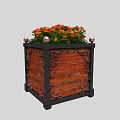 Roadside Decorative Planter With Wooden Structure Iron Ornaments And Orange Flowers Topped With Metal Balls