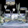 Elegant Wedding Stage Decorated With Table Settings Floral Arrangements And Lighting