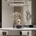 Modern Living and Dining Room Interior With Sofa Colored Pillows Striped Wall And Decorative Sculpture