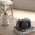 Vintage Digital Camera Placed On Wooden Table With Books White Vase And Flowers