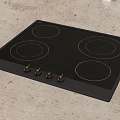 Modern Black Electric Cooktop With Four Circular Burners And Knob Controls For Kitchen