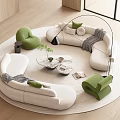 Modern Circular White Sofa Coffee Table Set with Green Chairs Potted Plant and Rug