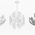Illuminated Irregular Pendant Lights With Floral Design Hanging On Grey Wall