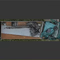 Teal Colored Dump Truck With Open Bed Metal Parts And Grass Surroundings