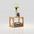 Modern Wooden Side Table with Round Cutouts Vase of White Flowers Photo Frame and Books