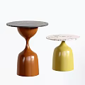 Two Stylish Side Tables With Brown And Yellow Bell Shaped Bases And Marble Tops