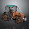Old Orange And Blue Tractor With Large Worn Tires On Gray Background
