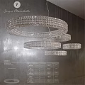 Elegant Modern Crystal Chandelier With Layered Circular Rings For Interior Decor