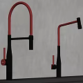 Two Modern Black And Red Faucets On Gray Wall Countertop Background