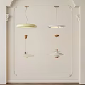 Modern Pendant Lights With Various Cream White Circular Layered Designs In Minimalist Interior