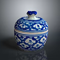 Blue and White Carved Jar with Ornate Lid and Intricate Patterns