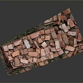 Partially Collapsed Red Brick Wall With Green Moss At Bottom On Gray Background