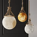 Stylish Spherical Pendant Lights With Rope Wrapped Metal Frames And Textured White Golden Surfaces