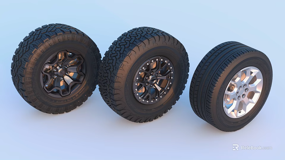 Three Different Automotive Tires With Various Tread Patterns And Alloy Rims 3d model 