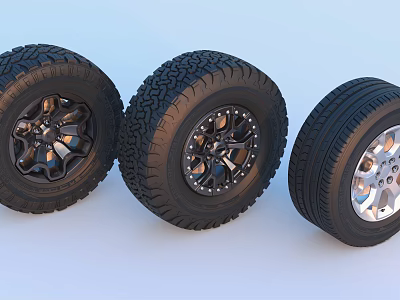 Three Different Automotive Tires With Various Tread Patterns And Alloy Rims 3d model
