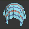 Blue Green Striped Fabric Covered Round Object With Orange And Blue Lines
