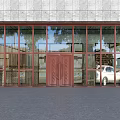 Carved Red Double Doors With Glass Windows In Grey Stone Facade Reflecting Trees And Car