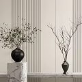 Two Vases With Green Branches And Bare Twigs On Marble Pedestal Against Striped Wall