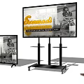 Man Standing in Front of Two TVs Displaying Scammell British Modern Classic Evolution