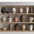 Ceramic Vessels Displayed On Wooden Shelves With Various Textures And Traditional Designs