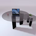Modern Round Tables With Laptop Cup And Small Green Plant On Surface