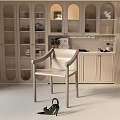 Elegant Modern Dining Chair In Light Colored Kitchen With Glass Front Cabinets