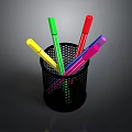 Colorful Writing Pens in Black Mesh Pen Holder for Office Desk