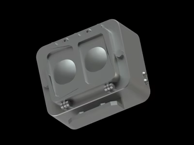 Gray Cube Shaped Mechanical Enclosure Featuring Two Circular Holes And Mounting Screws 3d model
