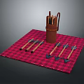Archery Weapons Arrows with Brown Leather Quiver on Red and Black Checkered Blanket