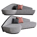 Modern Gray Sectional Sofa with Dark Gray and Pink Pillows and Black Trim Edges