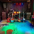 Home Music Room Setup With Audio Equipment Colorful Lights And Musical Instruments