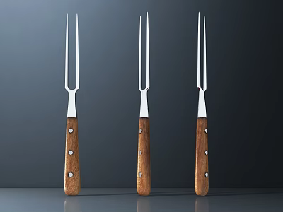 Three Metal Kitchen Forks Featuring Wooden Handles And Stainless Steel Tines 3d model