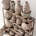Various Handcrafted Ceramic Vessels Displayed on Wooden Shelves with Unique Patterns