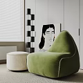 Green Bean Bag Chair with Cream Ottoman in Modern Living Room with Blinds and Painting
