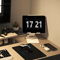 Modern Computer Desk Setup With Monitor Keyboard Mouse Desk Lamp And Digital Clock