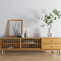 Wooden Minimalist TV Stand With Decorative Photo Frame And Plant Vase In Living Room
