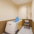 Hospital Outpatient Clinic Bright Waiting Area With Windows Greenery And Chairs