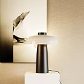 Modern Minimalist Table Lamp on Desk with Abstract Painting against Beige Wall