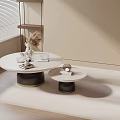 Modern Sofa and Two Round Coffee Tables with White Top Black Base Decorative Books