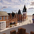 Historic Commercial Street with Red Brick Buildings Spire Towers Pedestrians Shops and Outdoor Seating