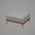 Modern Ottoman Design With Gray Cushion Brown Frame And Gold Legs