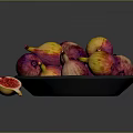 Fresh Purple And Yellow Figs On Black Plate With Sliced Half Showing Seeds