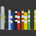 Assorted Colored Cylindrical Objects Including Striped And Solid Designs On