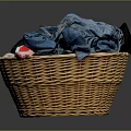 Wicker Storage Basket Filled With Colorful Clothes For Home Laundry Use