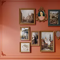 Orange Wall Decorated With Various Framed Paintings Mirrors And Ornate Decorative Items