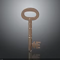 Copper Colored Hardware Key With Metallic Loop Handle And Classic Tooth Design