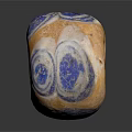 Hand Carved Circular Sculpture With Orange Blue Spiral Patterns And Hollow Center Design