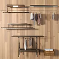 Metal Clothes Rack With Hanging Colored Clothes And Wooden Wall Interior