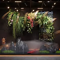 Indoor Landscape Design With Hanging Greenery Decorative Stones And Ambient Lighting Fixtures